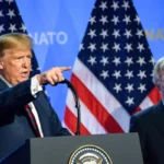 Дональд Трамп выступает на саммите НАТО рядом с Джоном Болтоном