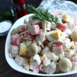 Салат з сиром косичка і крабовими паличками: швидкий рецепт